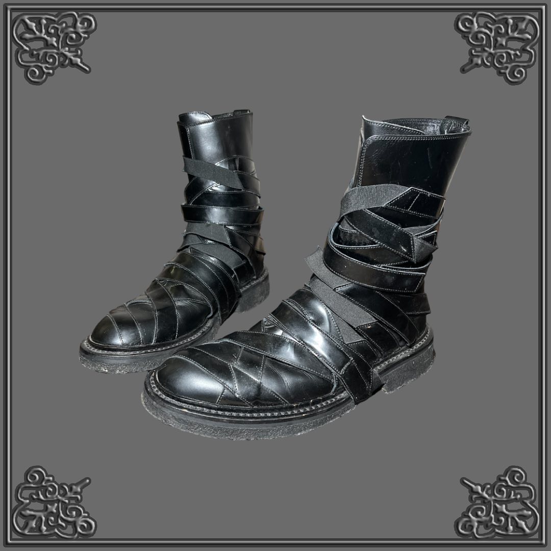 Strapped leather boots